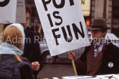 Pot is Fun Rally Peter Whelan (?) with poster. Piccadilly Circus 1967