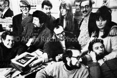 International Times Staff in Indica basement, Summer 1966. L-R: Jeff Nuttall, Miles, Jim Haynes, Peter Stansill, Tom McGrath, Sue Miles, Jack Henry Moore, Roger Whelan,David Z Mairowitz, Hoppy on phone and (?)